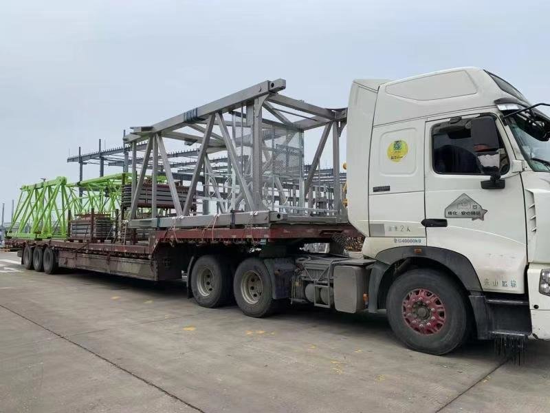 ZOOMLION’s Ultra-large Tonnage Tower Cranes Shipped in Batch to Assist in Building Tanzania’s Largest Hydropower Station